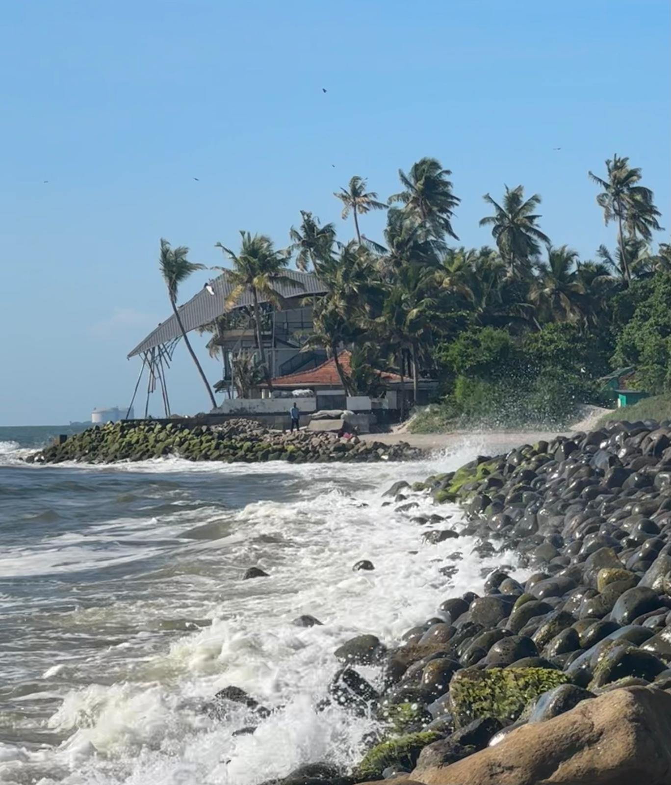 Waves breaking on the rocky Kochi coastline